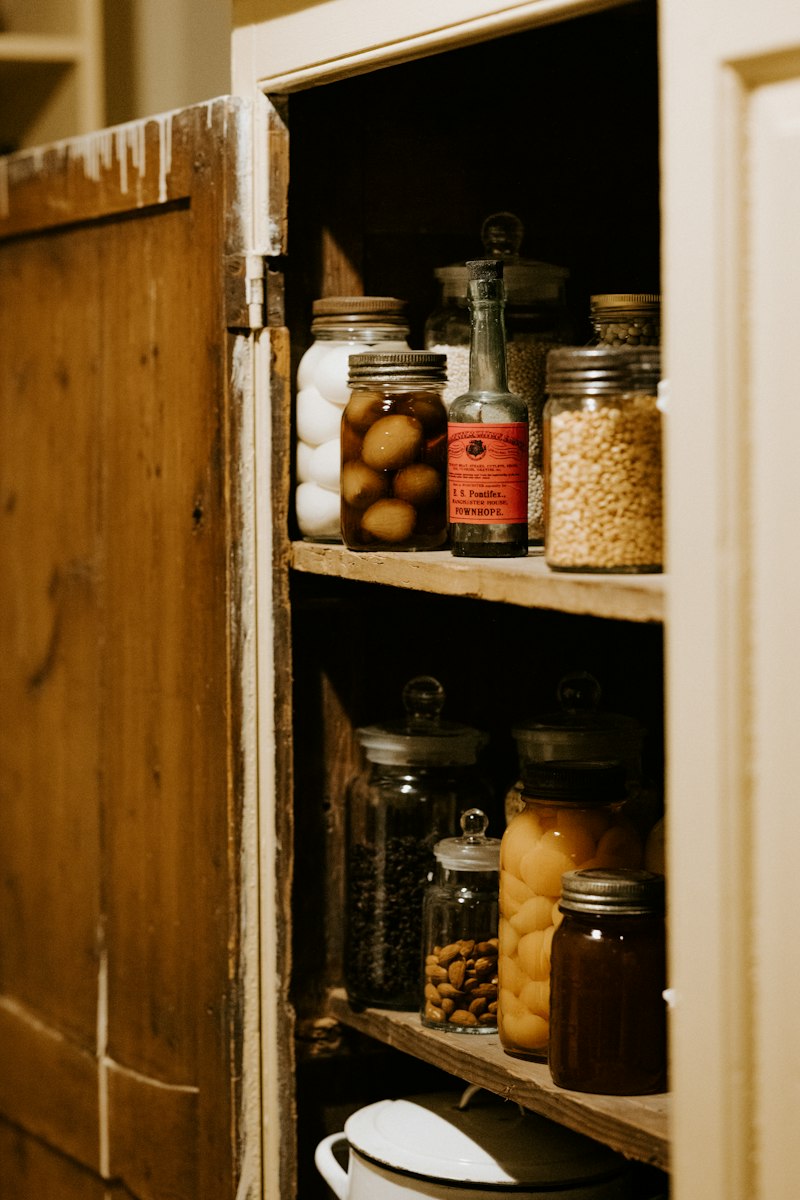Shelves of preserved food, illustrating organised pantry storage